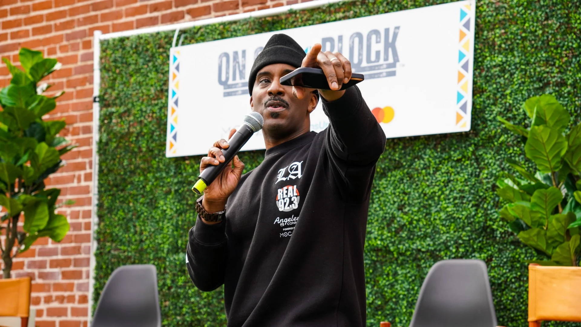 Entrepreneur speaking to a room at an On The Block community event